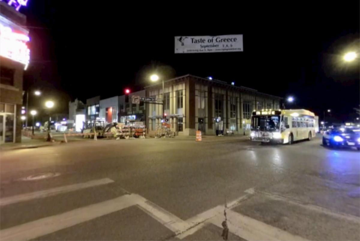city street at night as seen by a person with normal vision